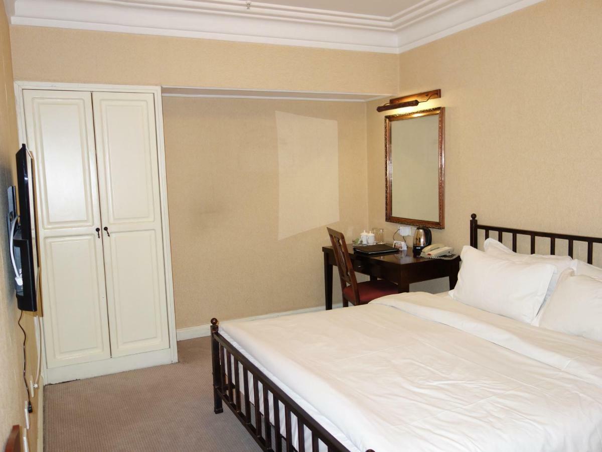 Harbin International Hotel Quarto foto